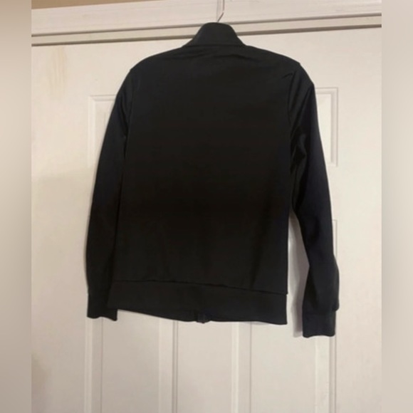 Adidas jacket is a unisex child’s size Small. - Picture 2 of 7